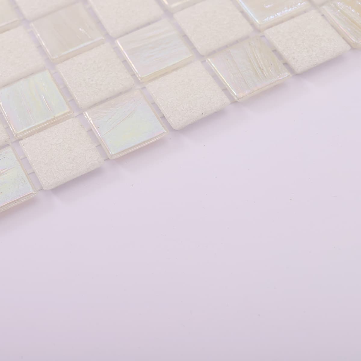 Edge view of white checkered frosted and iridescent glass mosaic tile