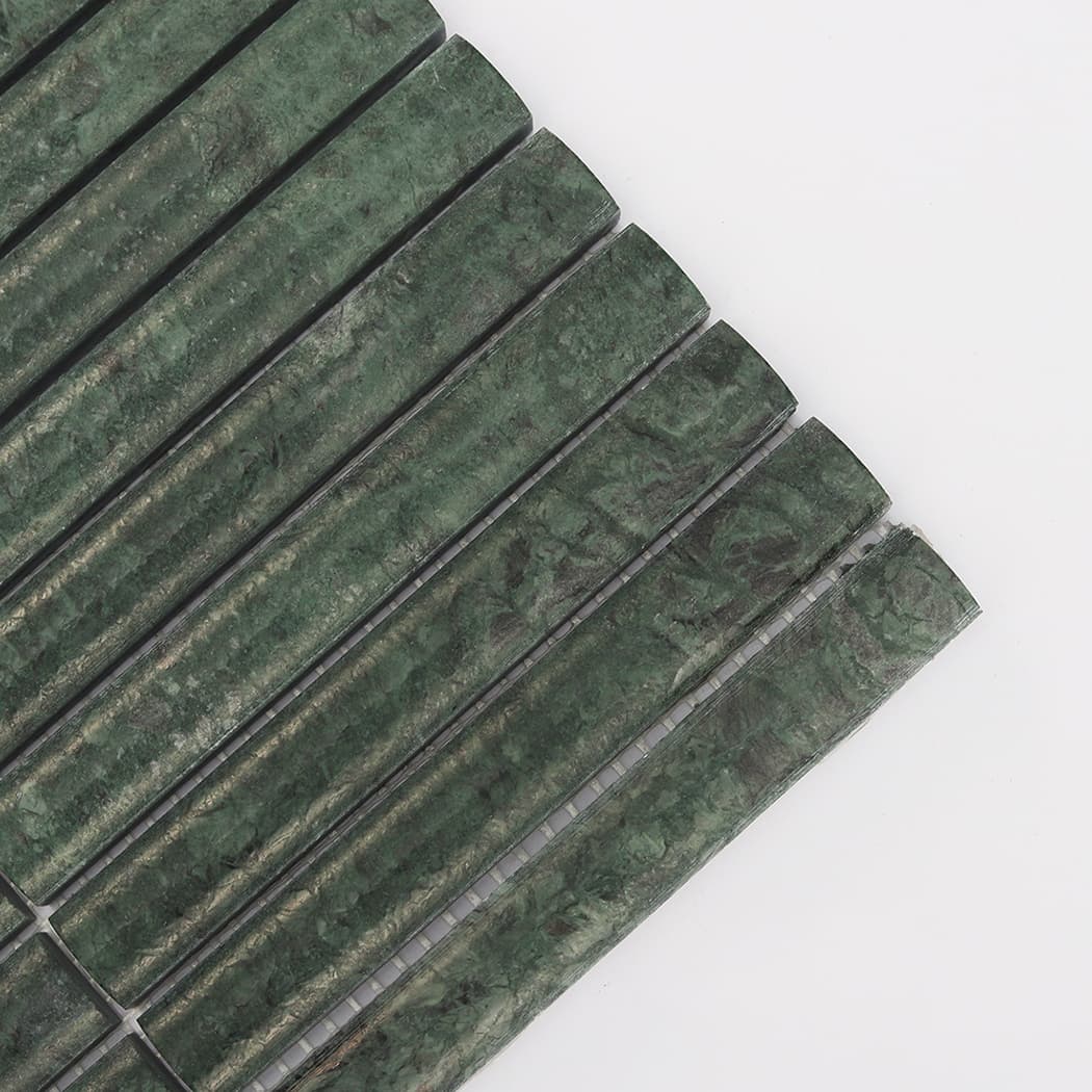 Detailed close-up showing the natural veining and texture on green marble strips.