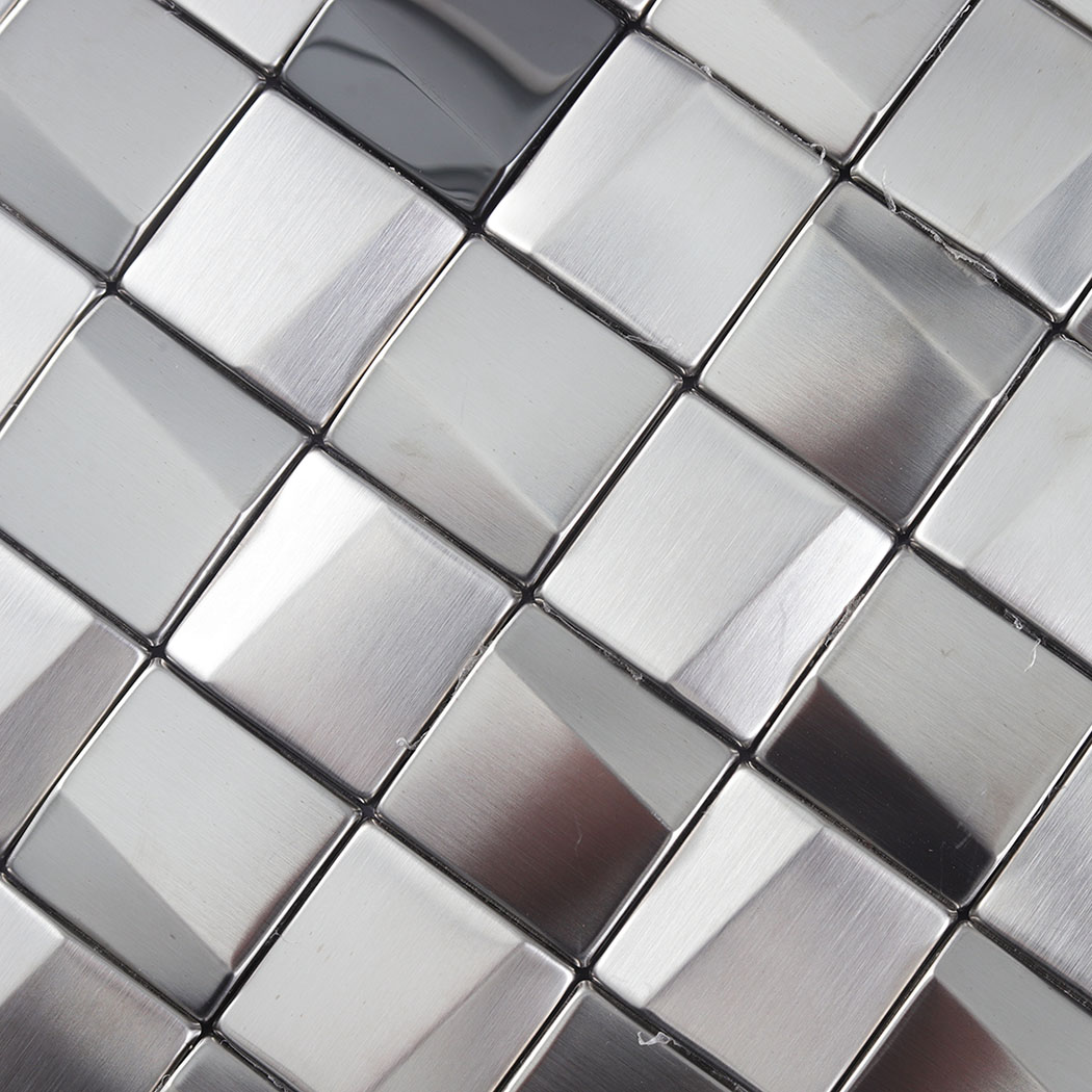 Detailed macro shot of silver 3D square metal tiles highlighting the brushed finish.