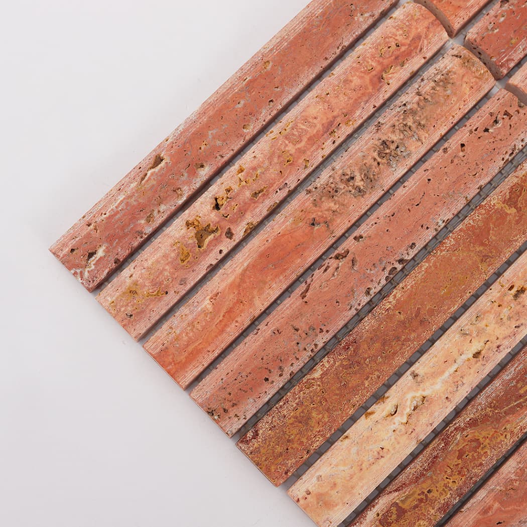 Detailed close-up showing the natural pits and textures of red travertine stone strips