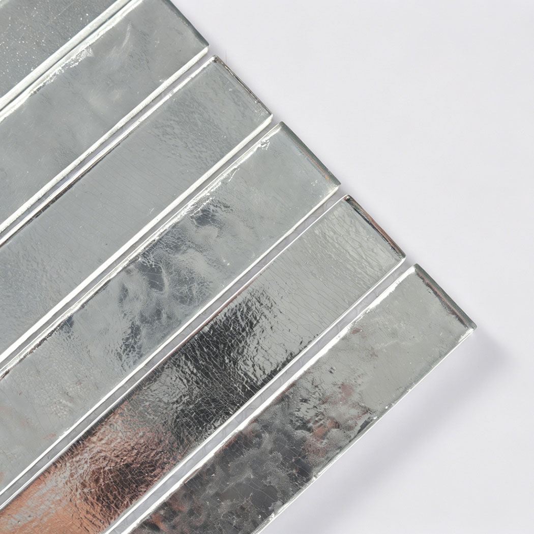 Close up showing the textured crackle and mirrored finish of silver glass strips.