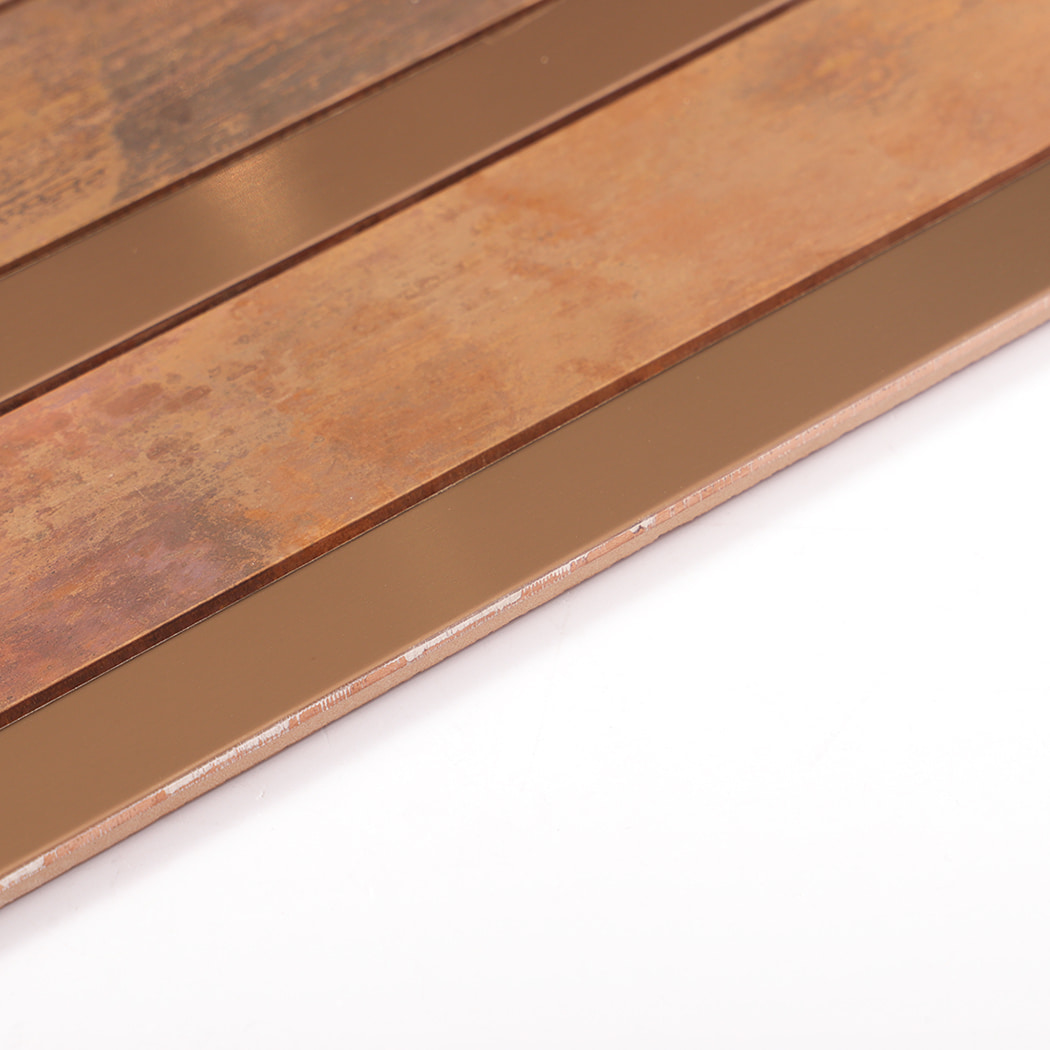 Edge view of copper stainless steel linear mosaic wall tile