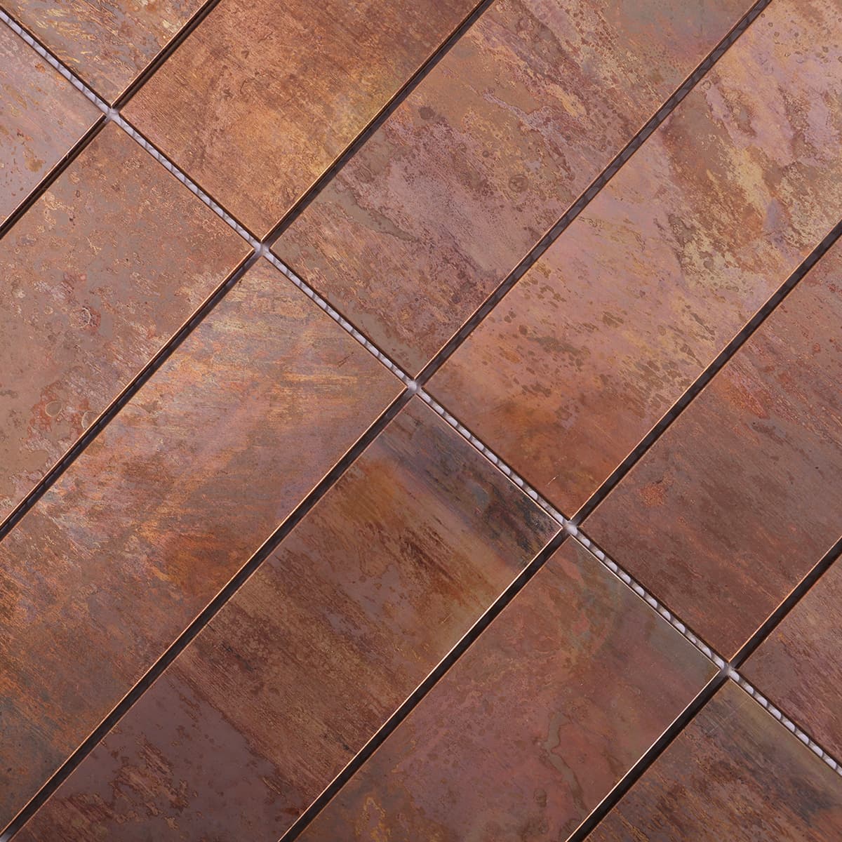 Textured copper mosaic brick shape close-up