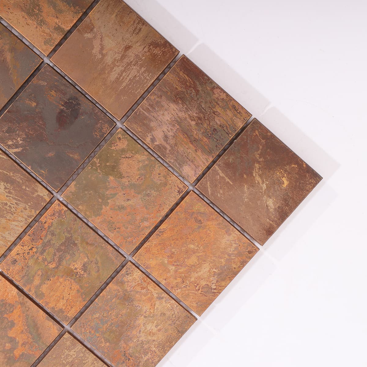 Corner detail of vintage copper mosaic surface