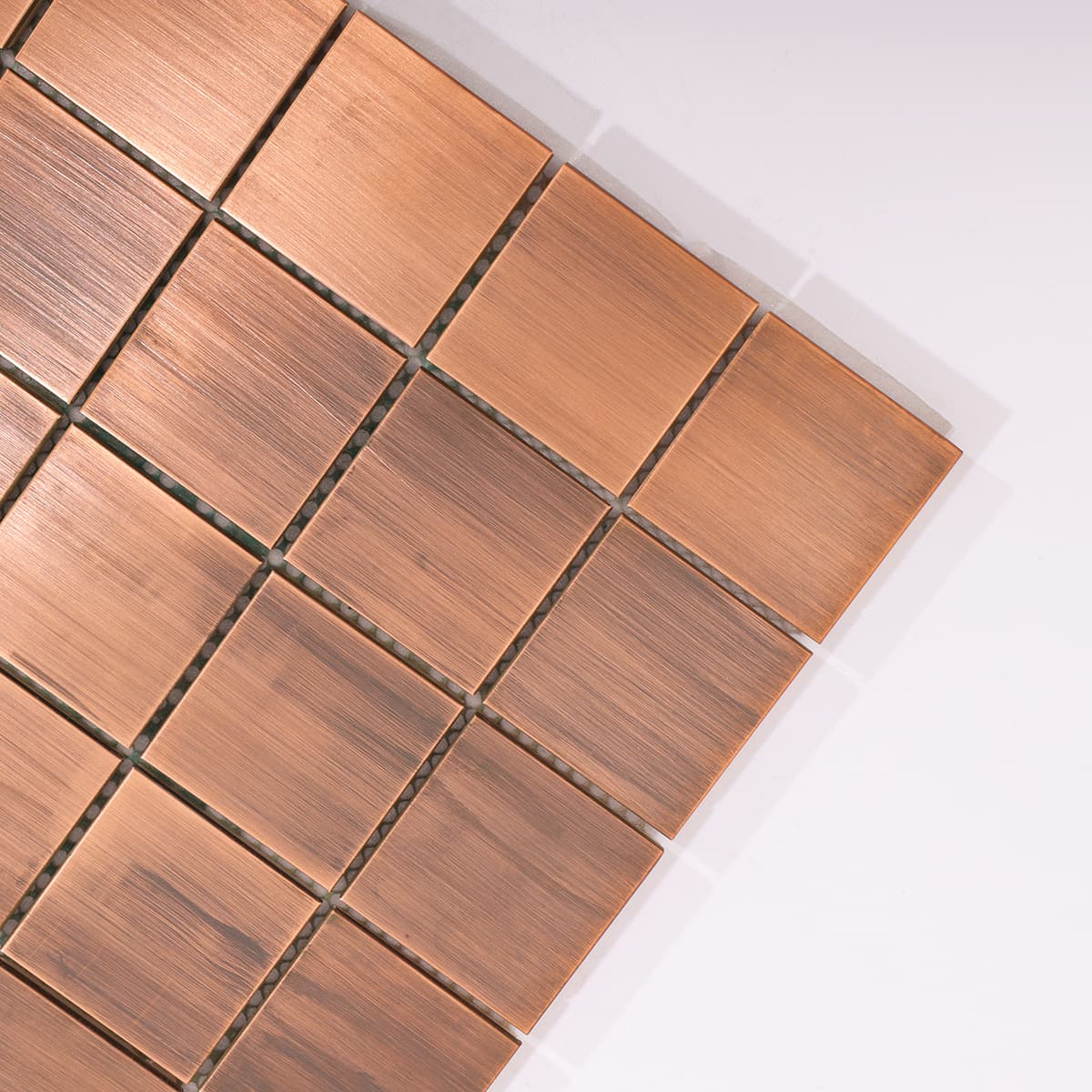 Close-up of copper mosaic tile corner edge