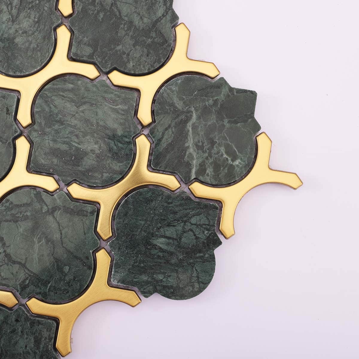 Close-up of corner detail showing gold and green marble connection