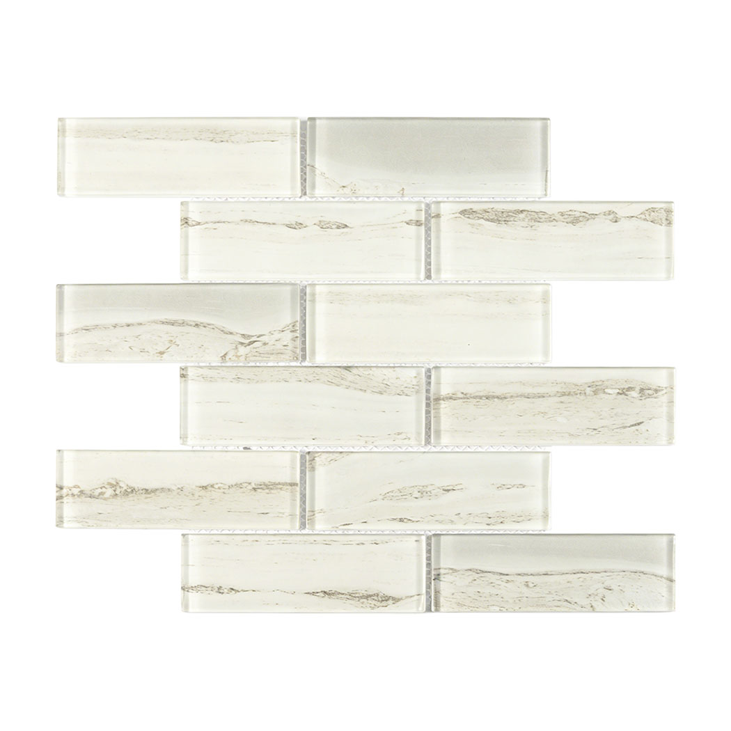 Cream white glass subway tile in staggered brick pattern with soft gray veins
