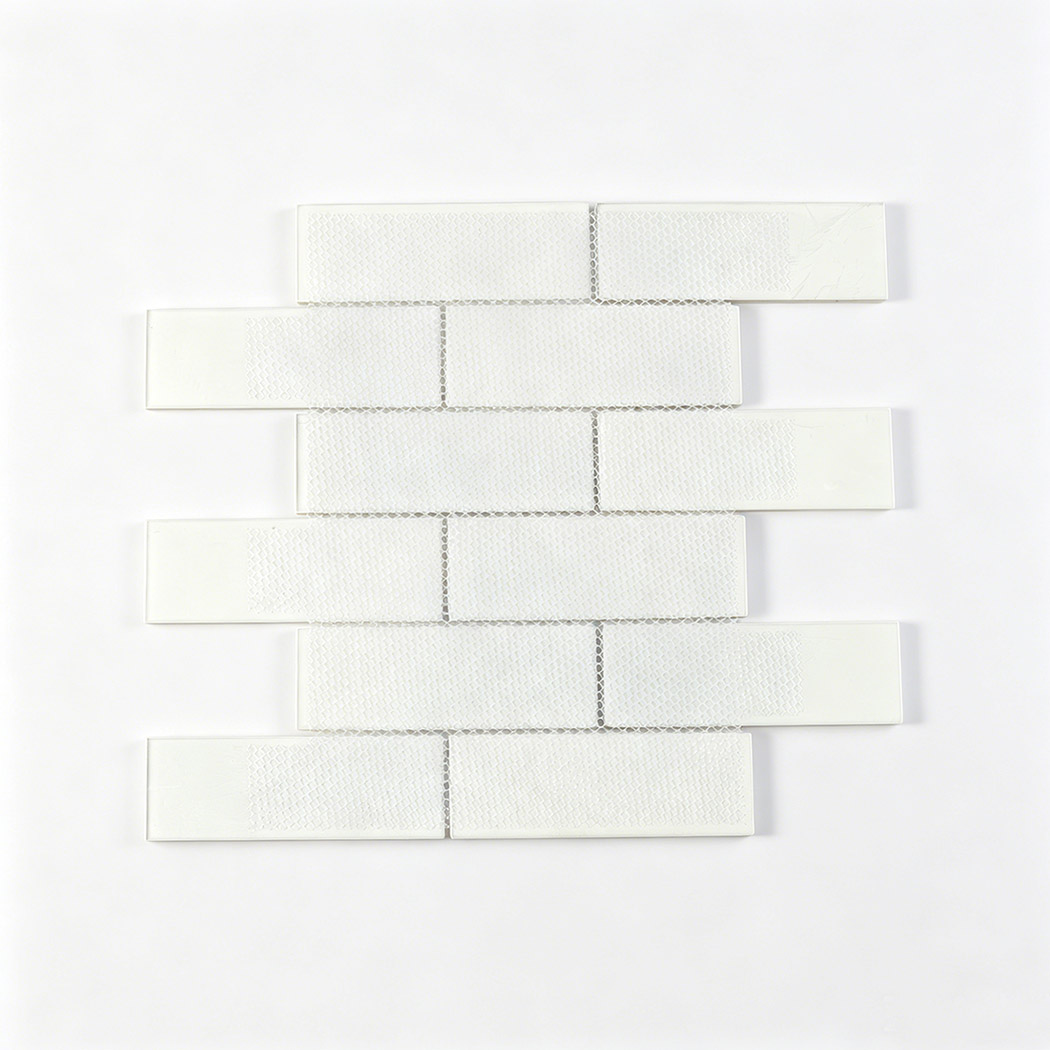 Back view of cream white glass subway tile sheet with white mesh mounting