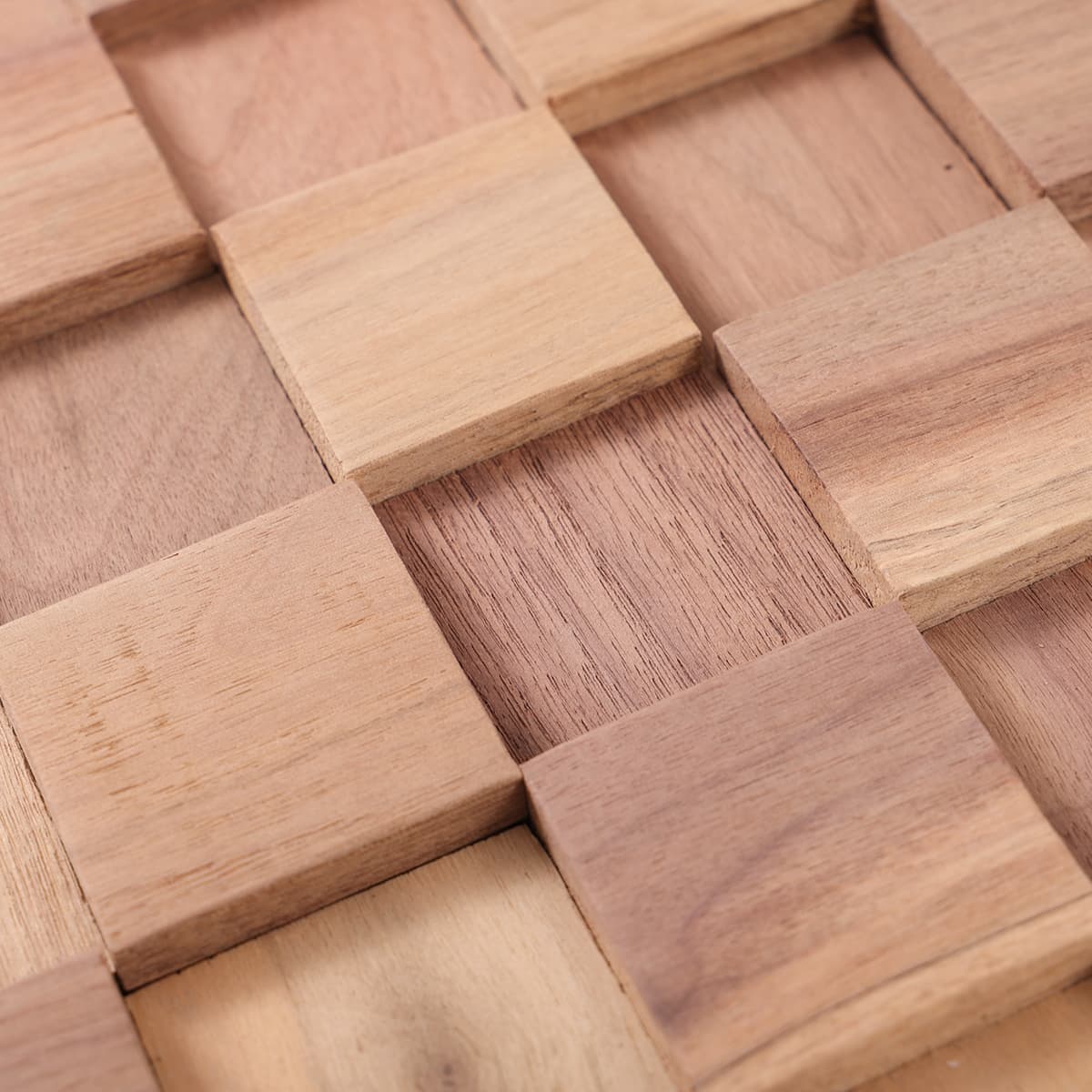Close-up of natural wood cube mosaic showing varied wood grain