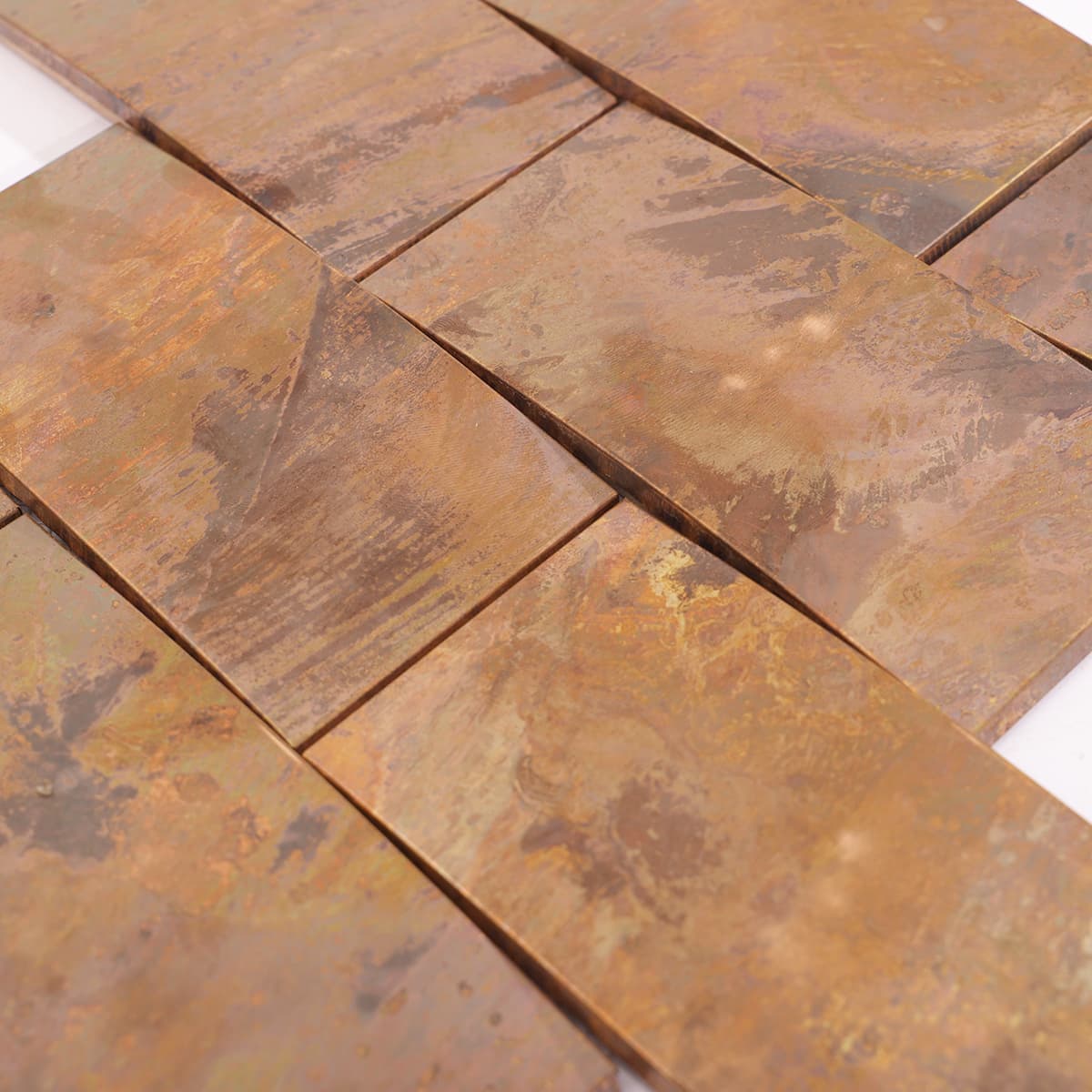 Surface detail of curved copper mosaic tile