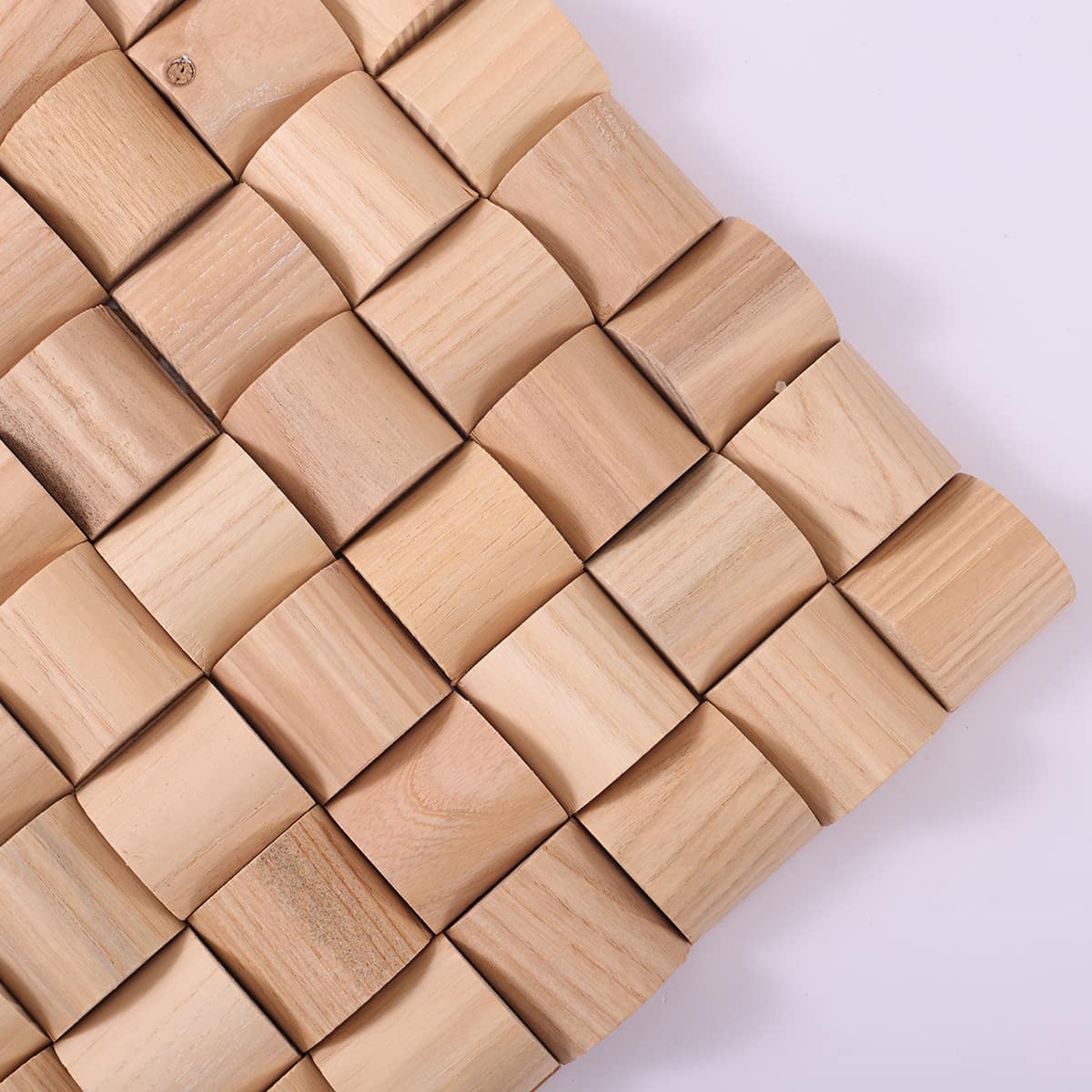 Corner section of curved light wood mosaic wall panel