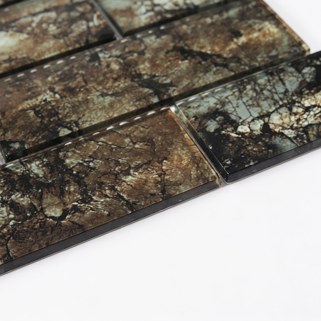 Dark bronze crackle glass subway tile edge with glossy raised surface