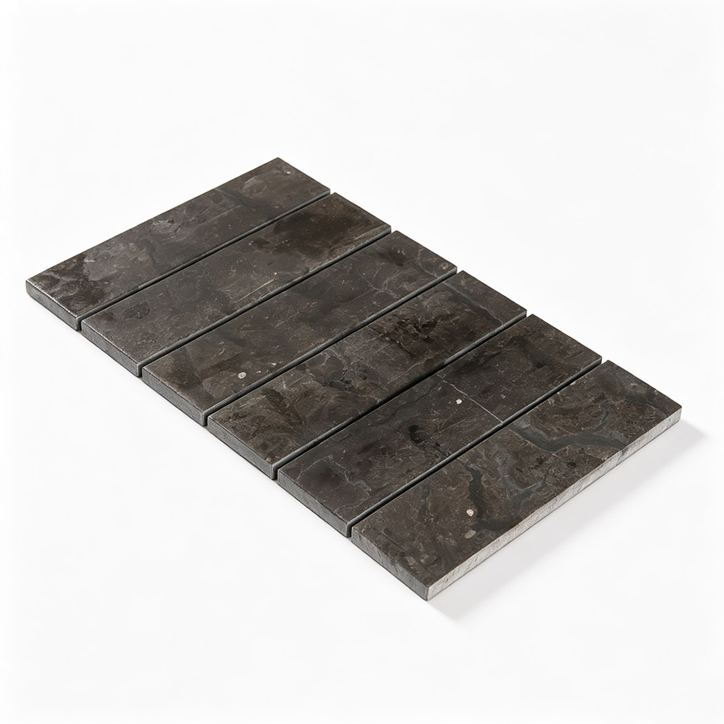 Angled full view of a dark brown marble stack mosaic tile sheet.