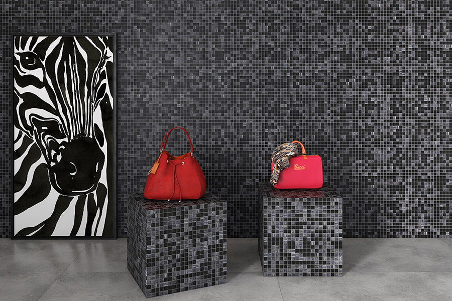 Dark Gray Tiles applied to display cubes and walls, showcasing versatile glass mosaic finishes
