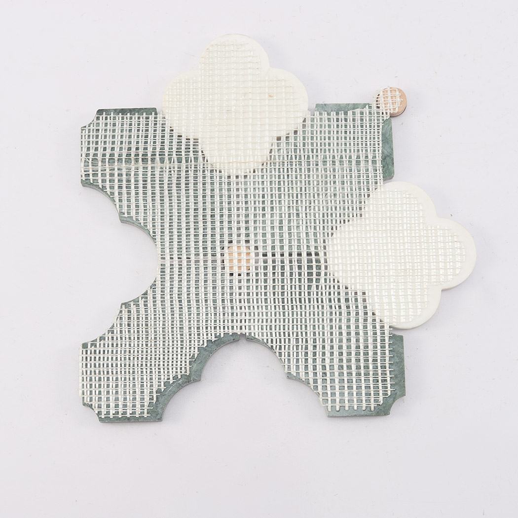 Back view of dark green arabesque marble mosaic tile with mesh backing