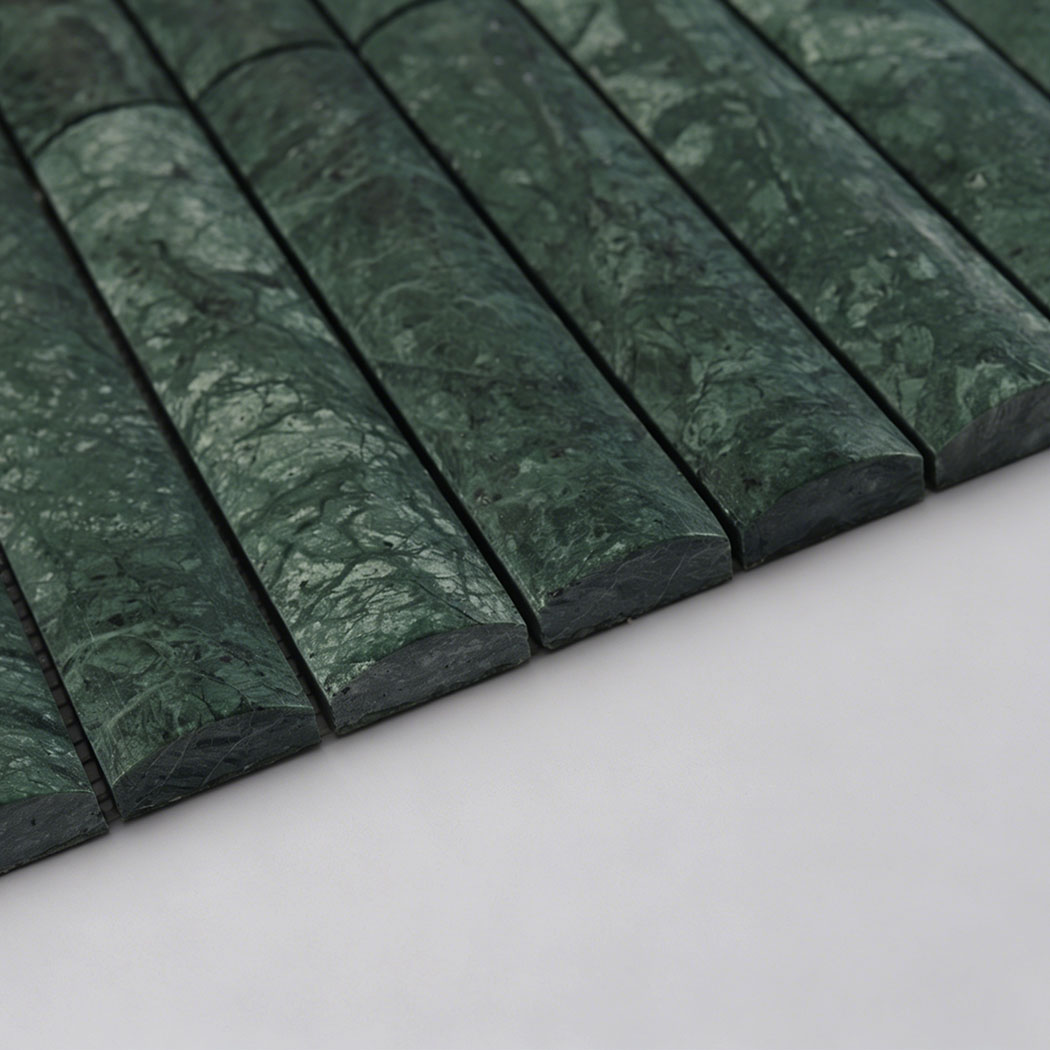 Side view of dark green marble raised rounded tile showing thick curved profile