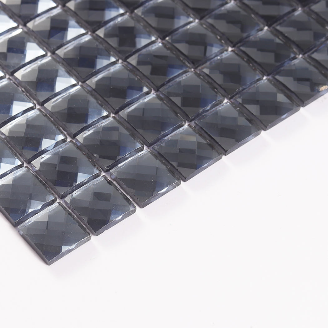 A side view capturing the specific thickness and edge detail of the dark grey mosaic tile.