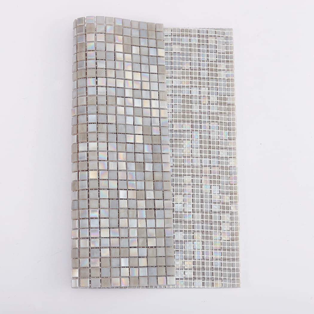 Back view showing mesh backing of iridescent dark grey glass mosaic tile