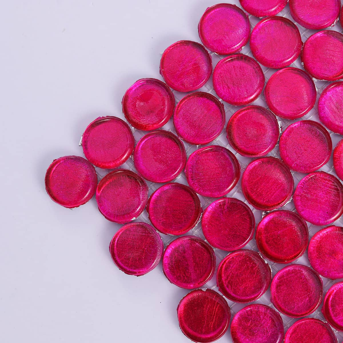  Close-up of deep pink glass mosaic tile corner details