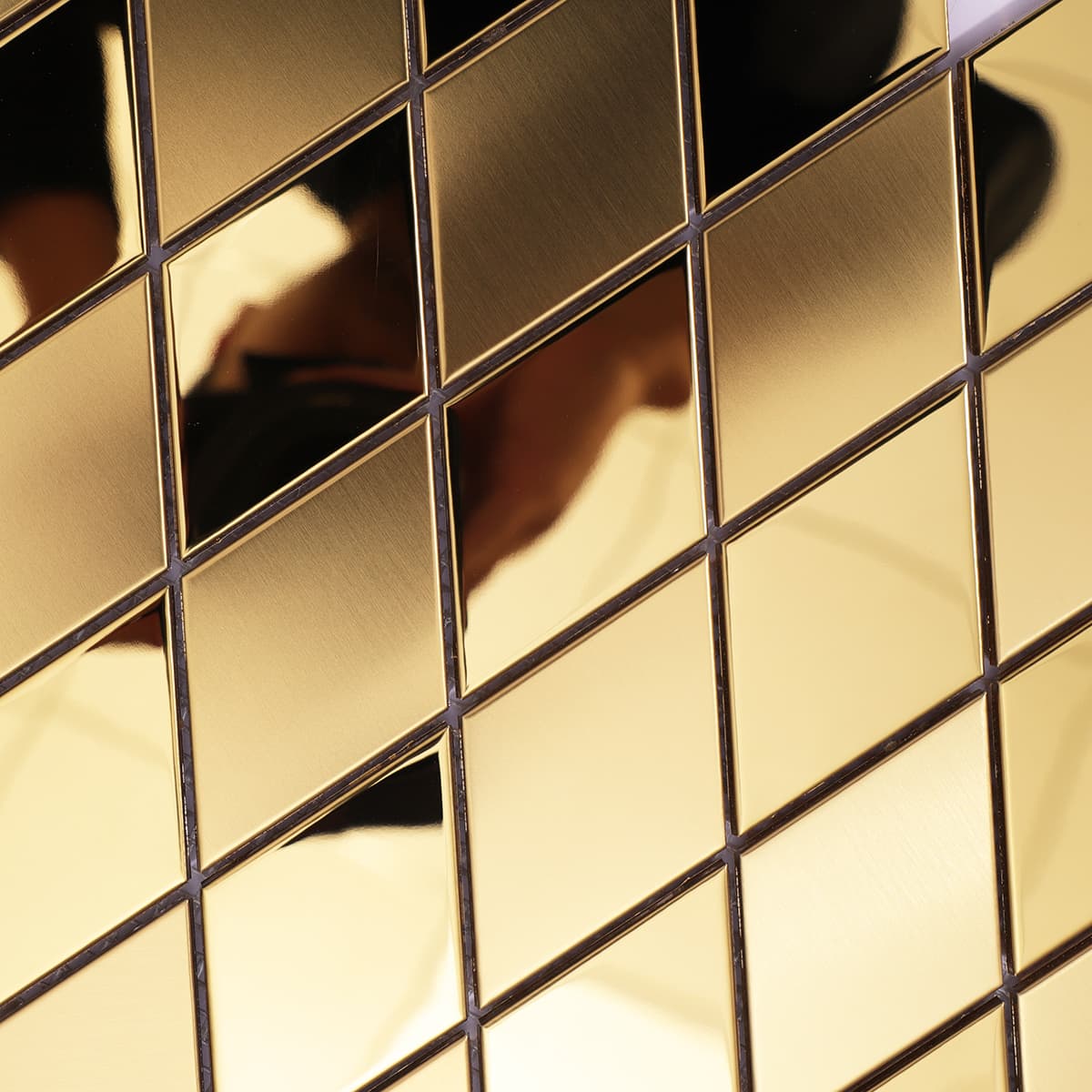 Texture close-up of diamond gold stainless mosaic