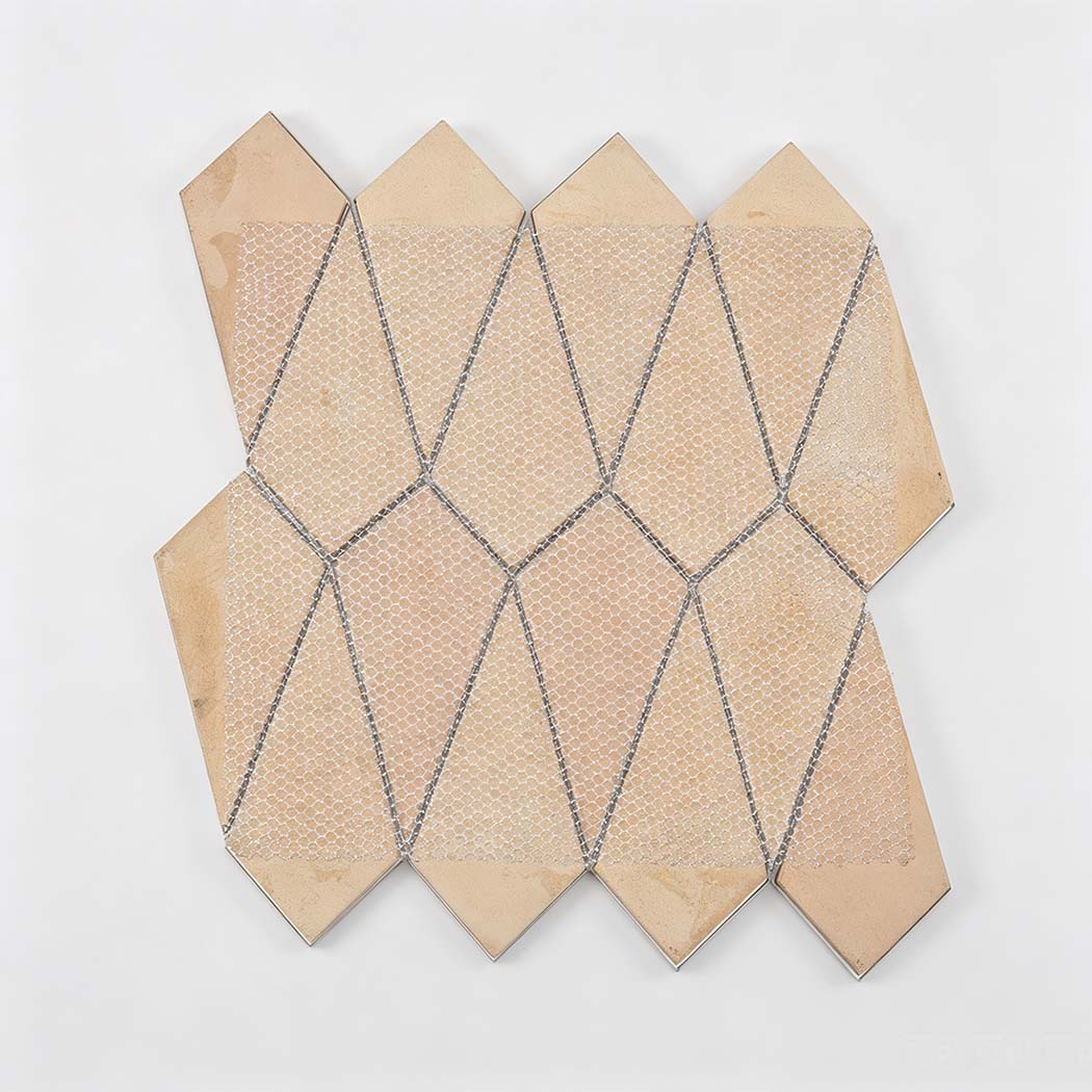 Back view of diamond shaped mosaic tile sheet with mesh backing