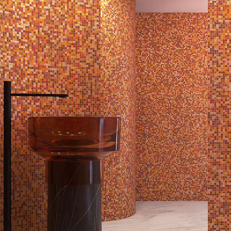 Brown mixed mosaic tiles on the curved bathroom wall.