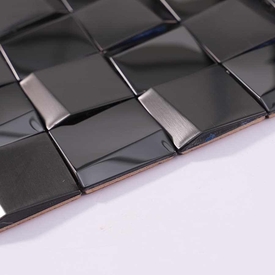 Edge view of black glossy and brushed 3D stainless steel mosaic tiles