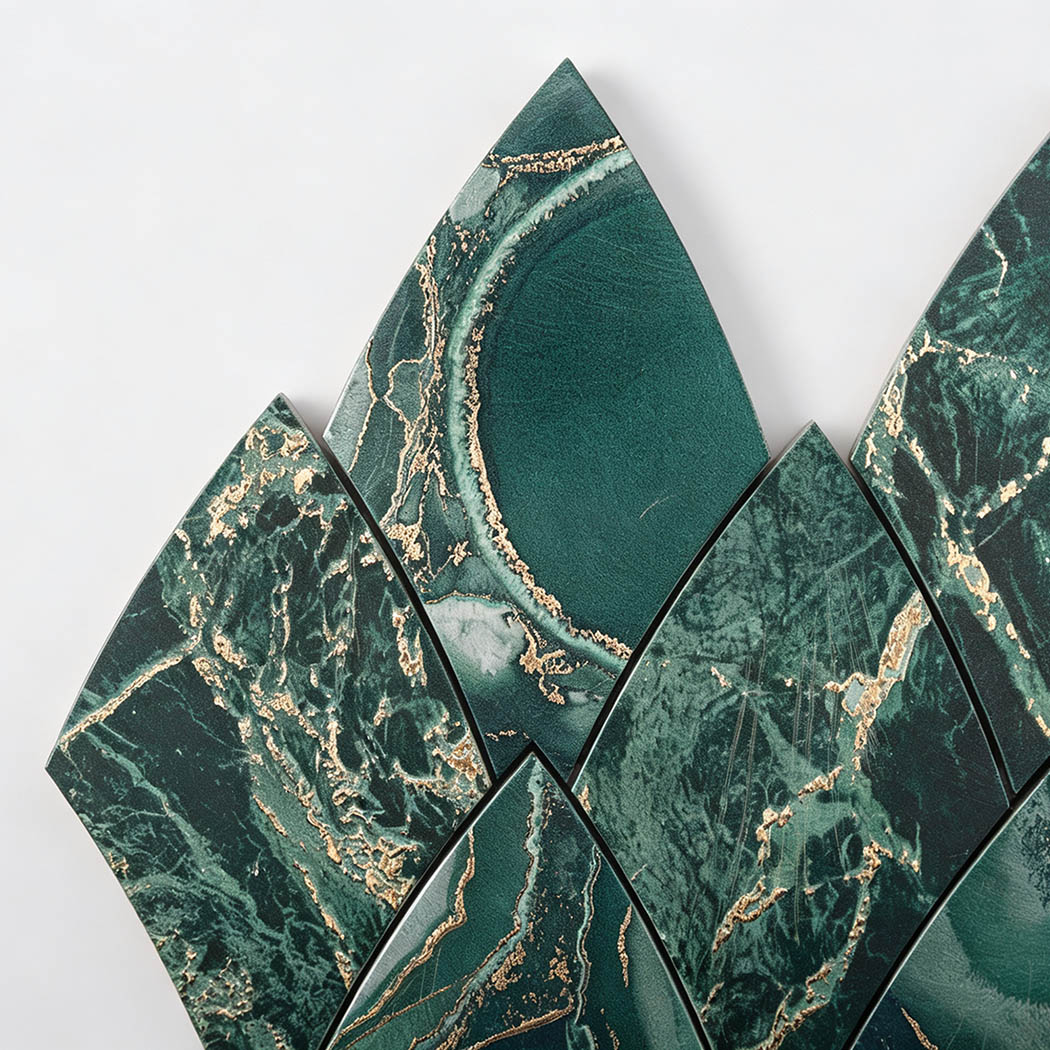 Top angle view of emerald green and gold leaf shape metallic tile corner