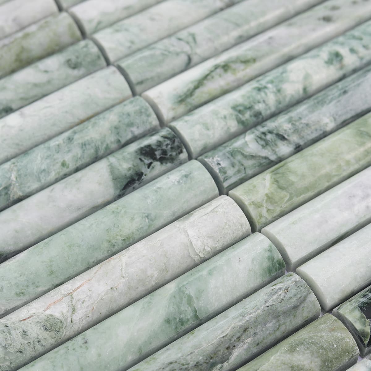 Close-up texture of emerald green fluted marble strips
