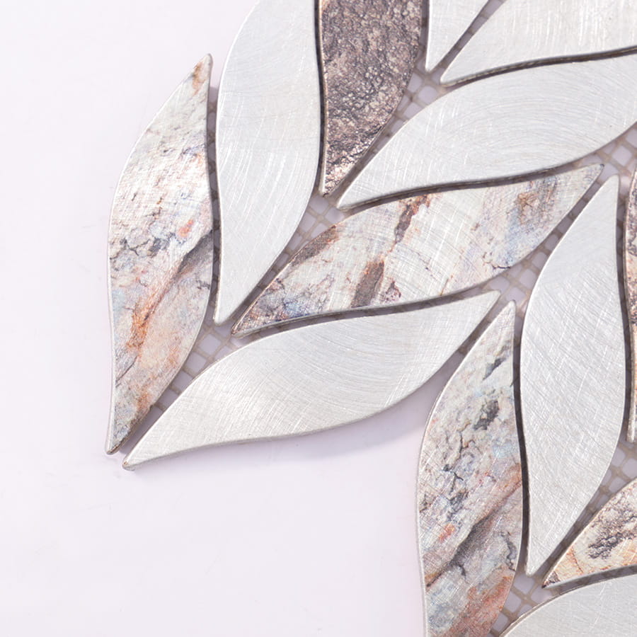 Corner close-up of feather leaf silver and brown  aluminum mosaic tile