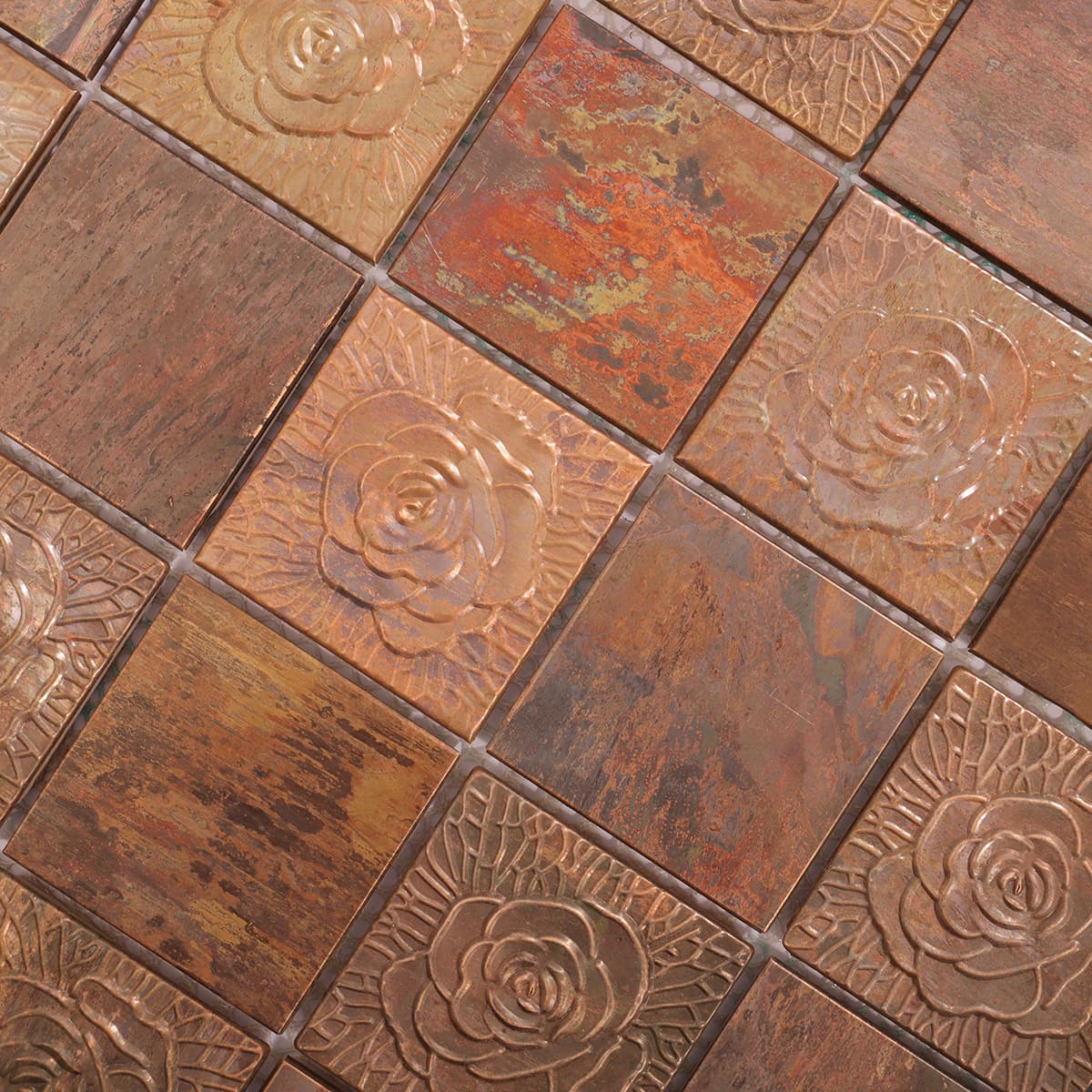 Closeup of floral copper mosaic tile surface