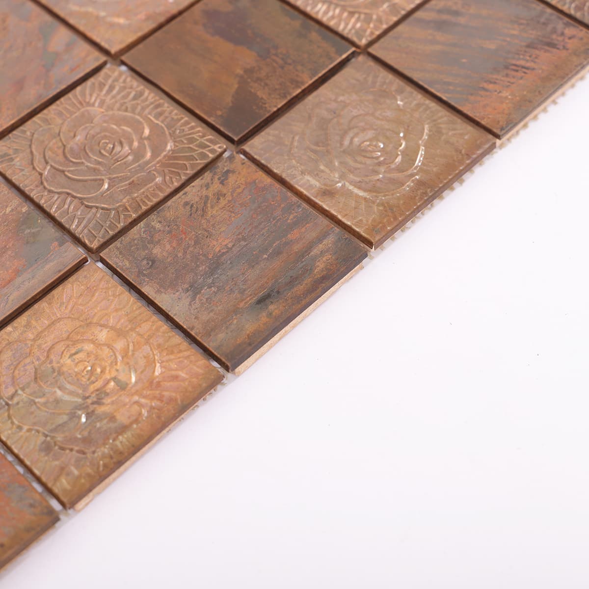 Side view of copper flower mosaic tiles in mesh sheet