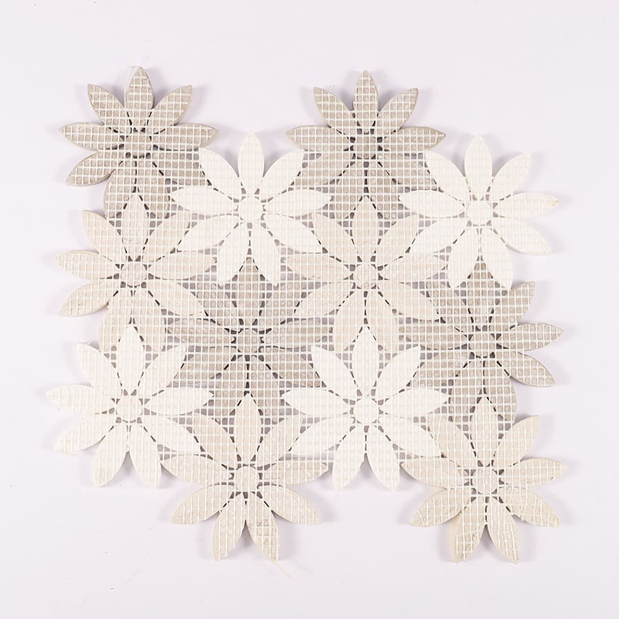 Back view of marble flower mosaic tile with mesh backing.