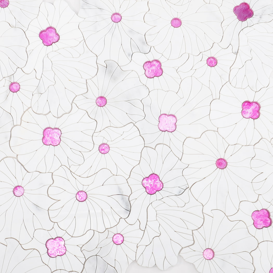 Layout display of multiple white marble flower mosaic tile sheets with pink glass accents.