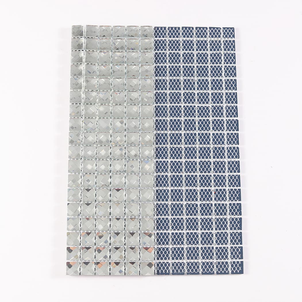 Folded silver mirror glass mosaic tile sheet showing its flexible mesh backing on reverse.