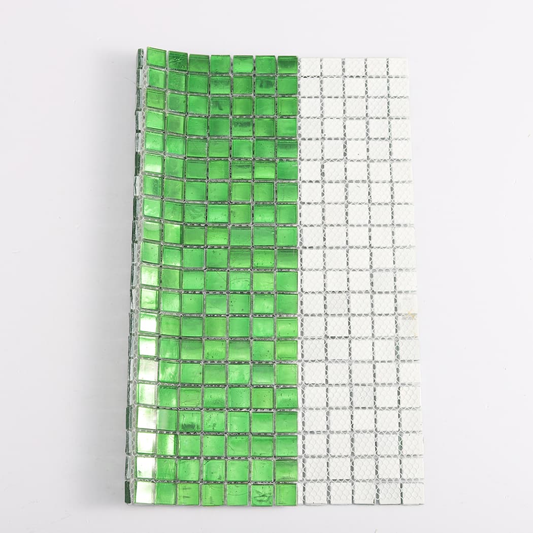 forest green glass mosaic tile sheet showing front tiles and white mesh backing