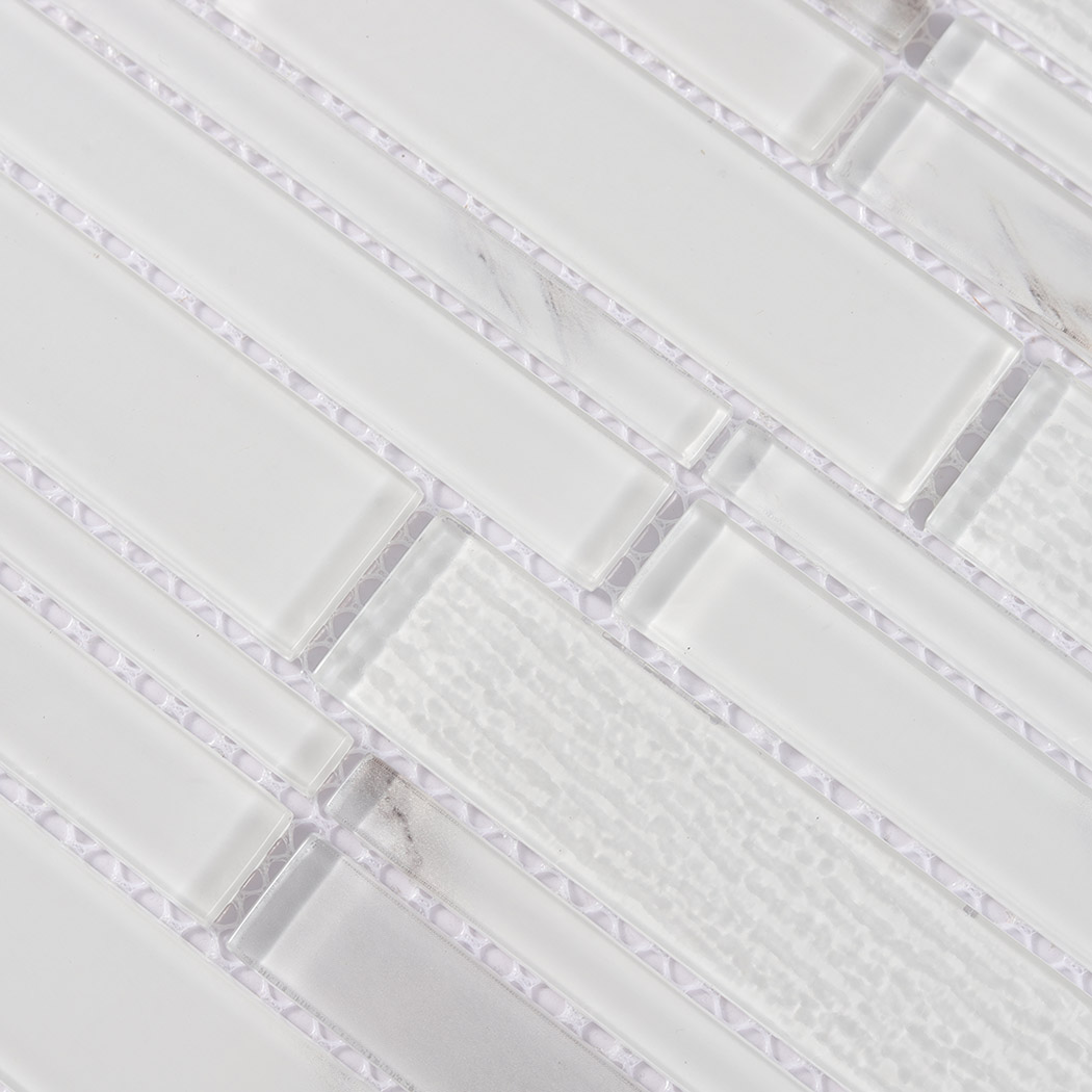 Close view of frosted white glass linear mosaic with mixed smooth and textured strips