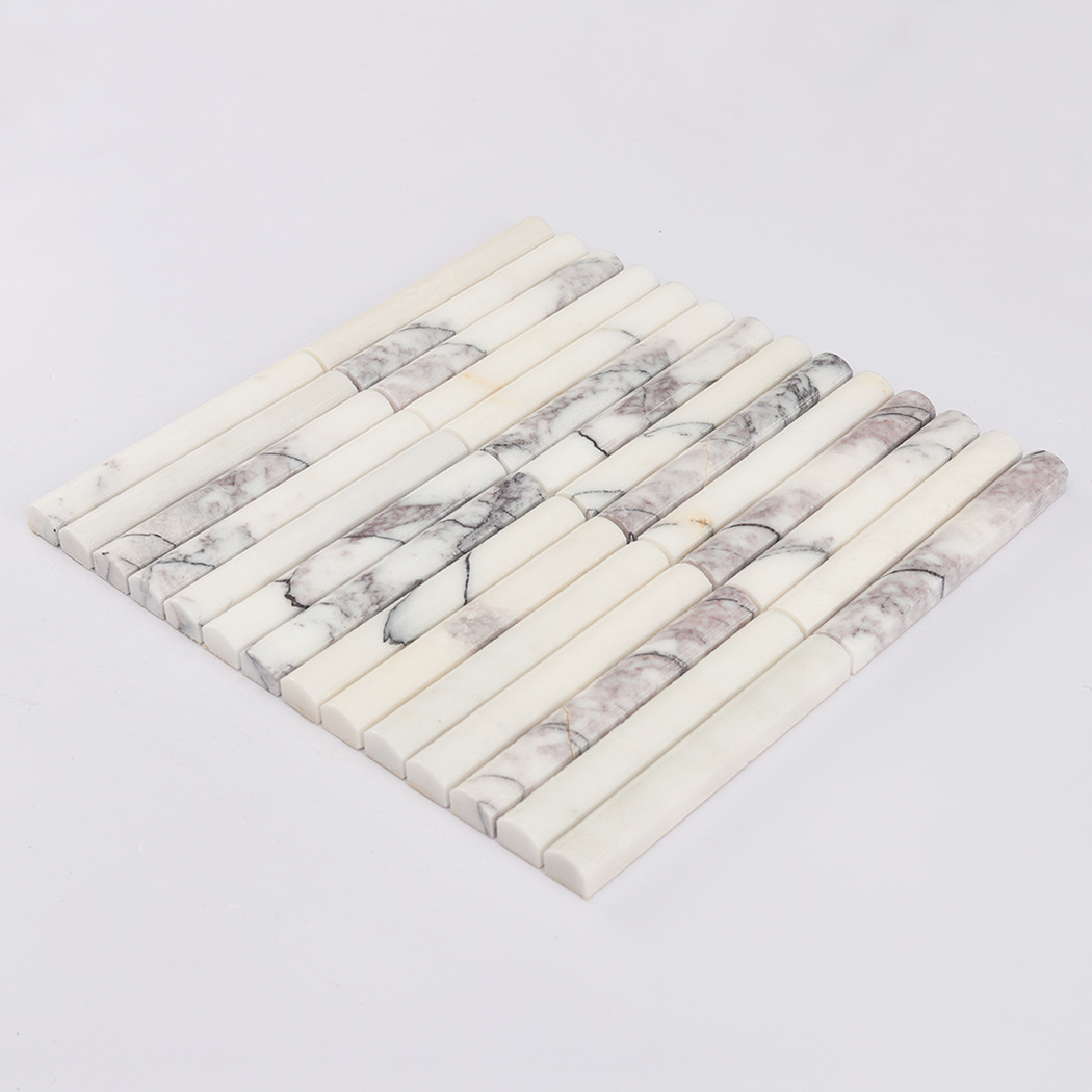 Full sheet of white marble pencil mosaic tile with grey veins displayed at an angle.