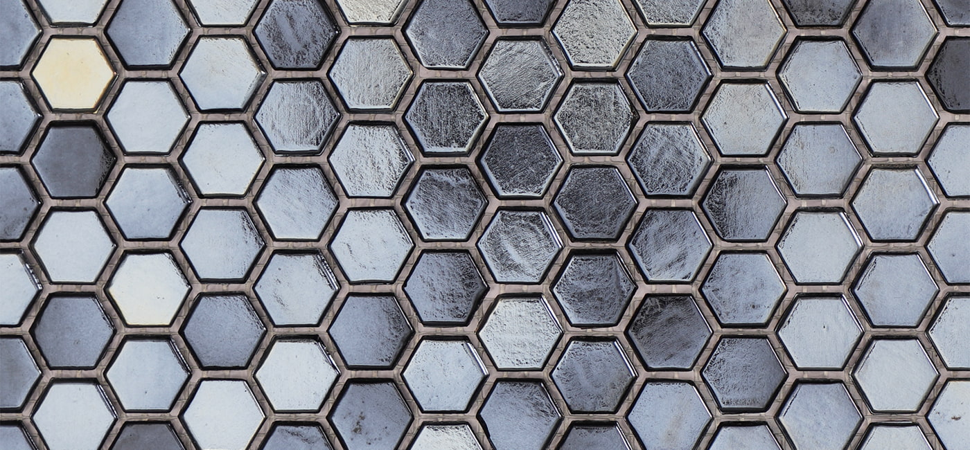 Wide shot of metallic-finish hexagon glass tiles