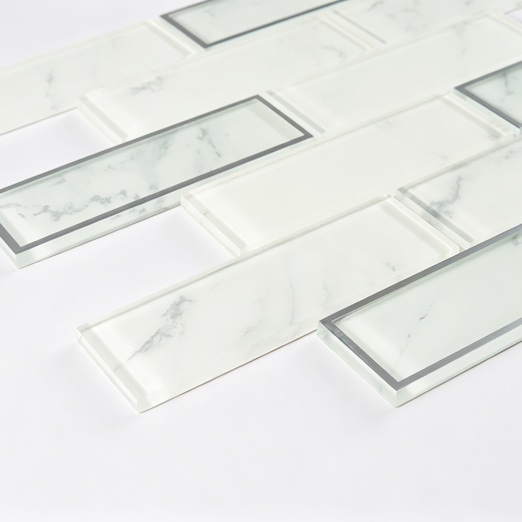 Glossy white glass subway tile with faint gray veins and silver outline pieces