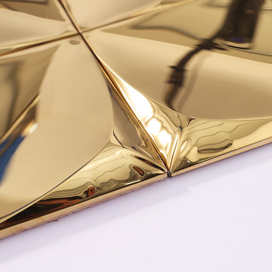 Gold 3D square tile angled view showing shine