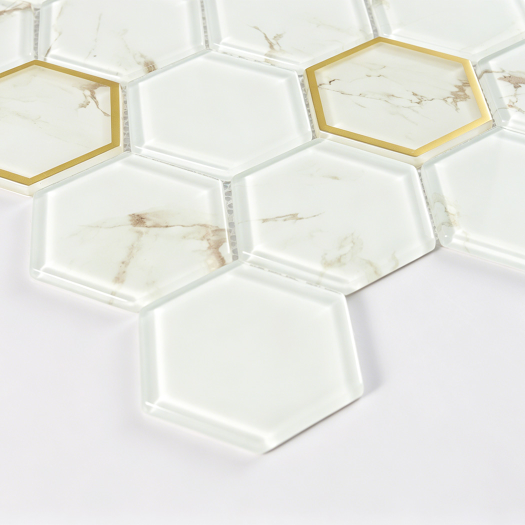 White marble hexagon glass tile detail with beveled edges and gold glass frames
