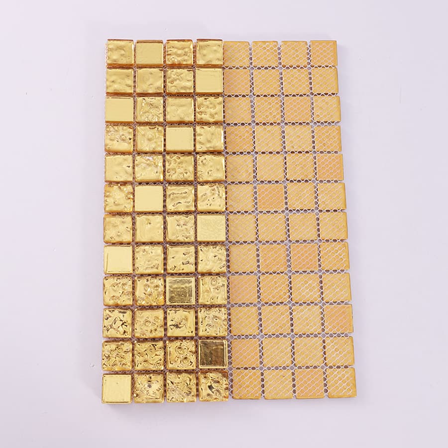 Front and back view of gold glass mosaic tile showing mesh backing.