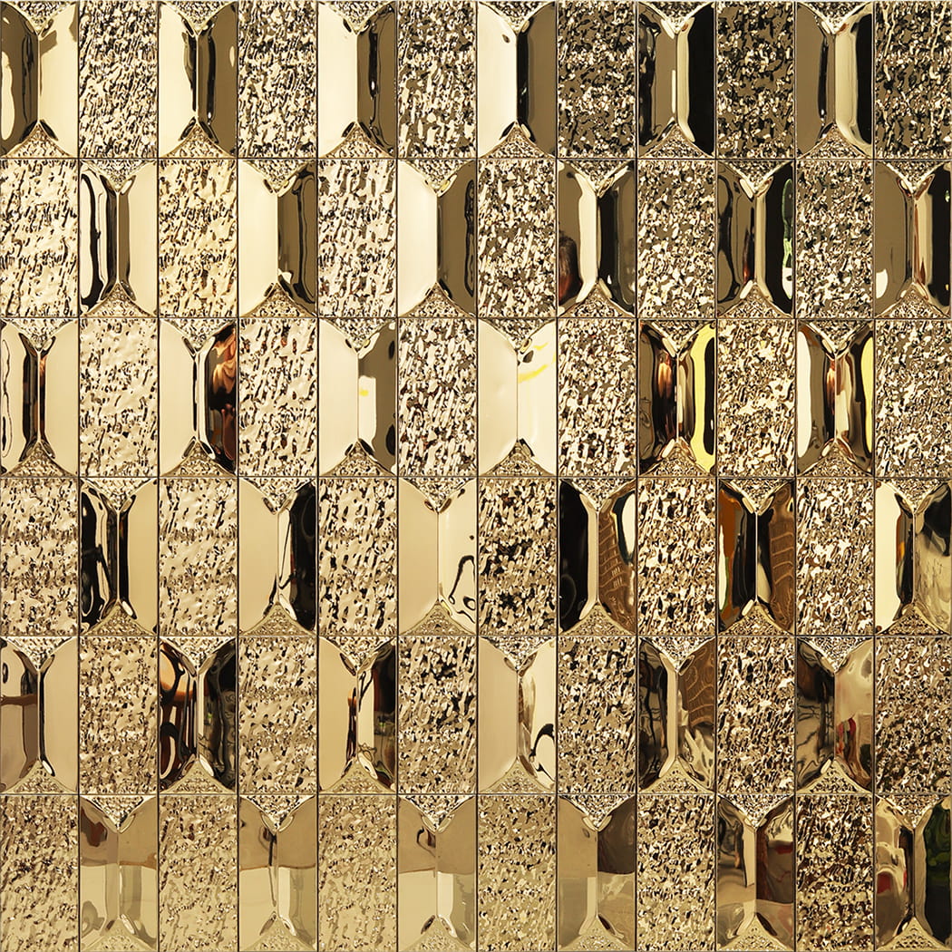 Seamless wall pattern of mixed texture gold metallic mosaic tiles.