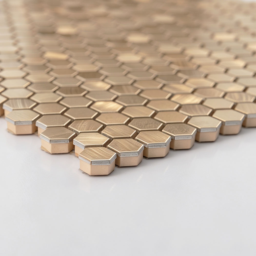 Side view showing edge bevel and layer thickness on gold hexagon tile