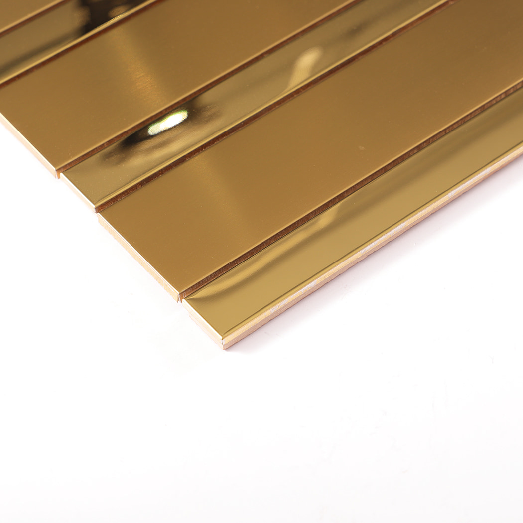 Edge angle view of gold stainless steel vertical strip wall tile sheet