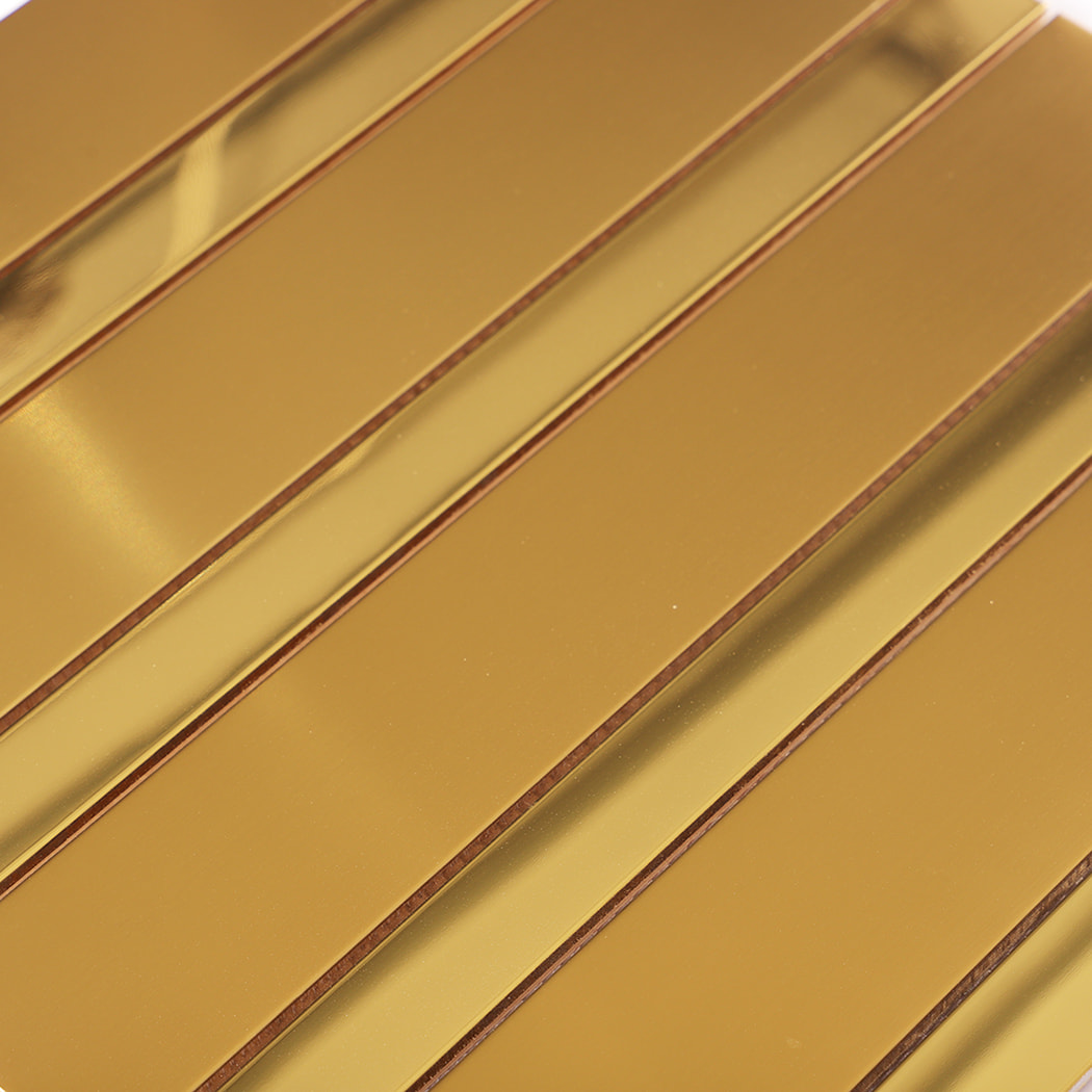 Brushed gold stainless steel vertical strip tile surface texture close-up