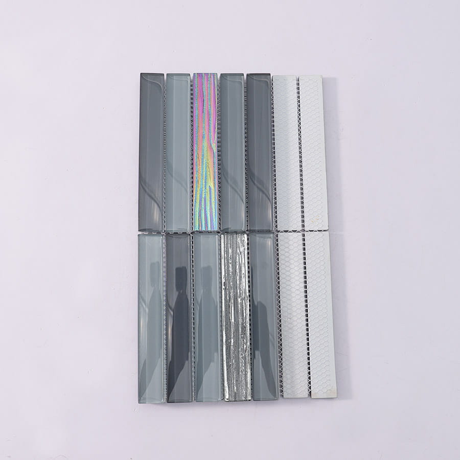 Back view of gray and iridescent crystal glass mosaic wall tile with mesh backing