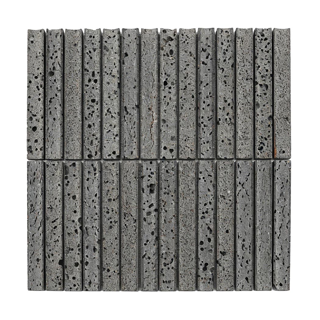 Full sheet of gray lava stone linear mosaic tile with porous rectangular strips