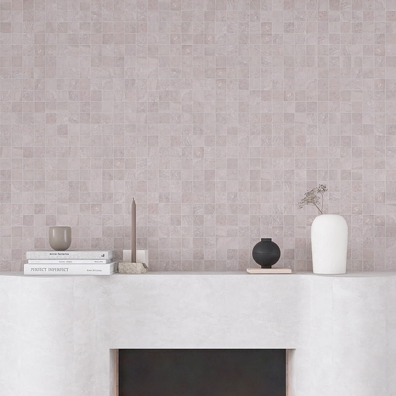 Elegant gray marble mosaic wall with small square tiles above a modern mantel